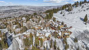 Snowy aerial view with a mountain view