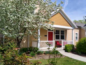 View of front of property with covered porch