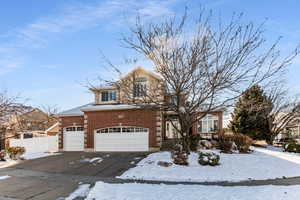 View of front of home featuring a garage