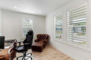 Home office featuring light wood-type flooring