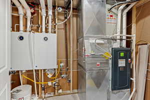 Utilities with water heater, tankless water heater, and heating unit