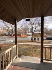 View of yard with a porch