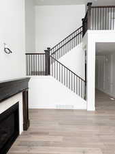 Staircase with wood-type flooring