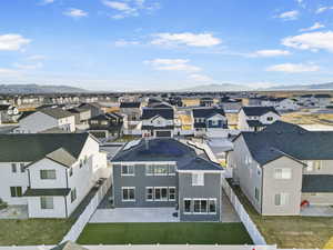 Birds eye view of property with a mountain view