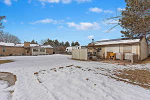 View of yard covered in snow