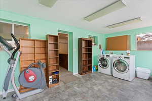 Clothes washing area with washing machine and clothes dryer