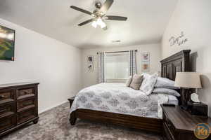 Bedroom with carpet and ceiling fan