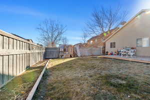 View of yard featuring a playground and a wooden deck