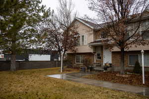 View of front facade with a front lawn