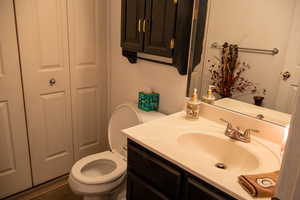 Bathroom with vanity and toilet