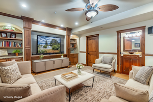 Virtually staged Theater / Family room area in basement