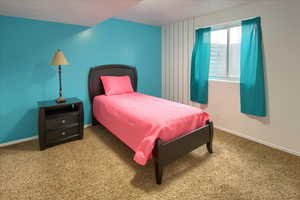 Bedroom 4  featuring carpet flooring