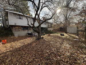 View of yard featuring a storage shed