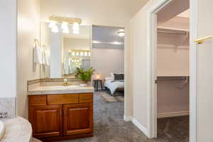 Bathroom featuring a bathtub and vanity