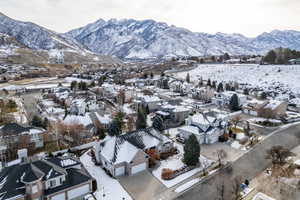 Snowy aerial view with a mountain view