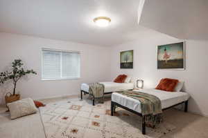 View of carpeted bedroom