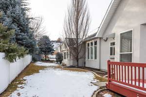 View of yard covered in snow