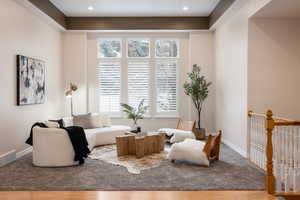 Sitting room featuring hardwood / wood-style flooring