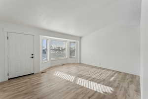 Entryway featuring light hardwood / wood-style flooring