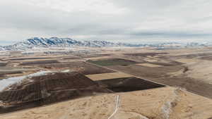 Snowy aerial view featuring a mountain view