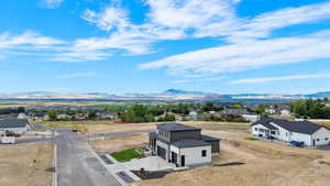 Drone / aerial view featuring a mountain view