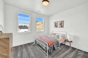 Bedroom featuring carpet