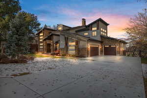 View of property exterior at dusk