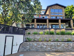 Rear view of property featuring a porch