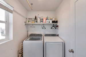 Laundry room featuring washing machine and dryer