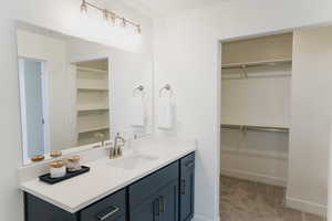 Pics are of model home.Bathroom with vanity