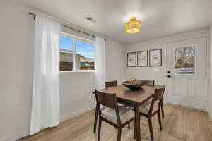 Dining area featuring light hardwood / wood-style floors