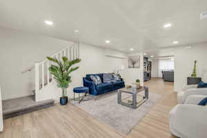 Living room featuring hardwood / wood-style flooring