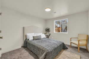 View of carpeted bedroom