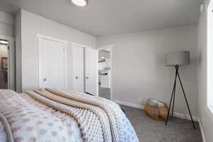 View of carpeted bedroom