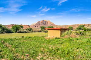 Property view of mountains with a rural view