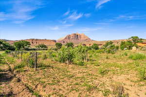 Property view of mountains with a rural view