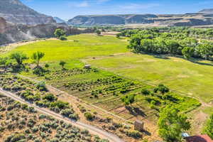 Birds eye view of property featuring a mountain view and a rural view