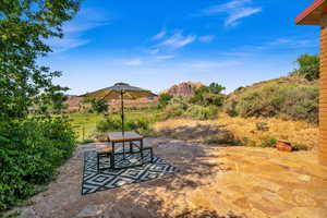 View of patio with a mountain view