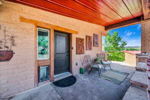 Doorway to property with a porch