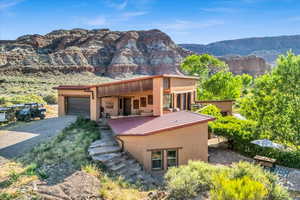 Exterior space featuring a mountain view and a garage