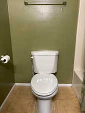 Upstairs bathroom with tiled flooring