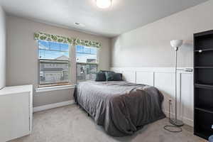 View of carpeted bedroom