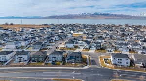 Drone / aerial view with a water and mountain view