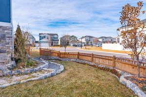 View of yard featuring a garage