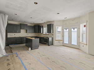 Kitchen with french doors and a kitchen island