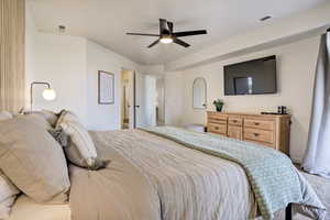 Bedroom with carpet and ceiling fan