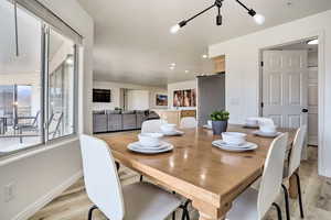 Dining space featuring light hardwood / wood-style flooring