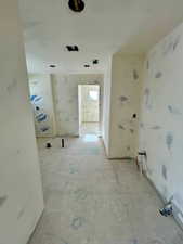 Primary Bathroom, with view to closetPhoto taken 1/31/25