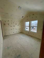 Bedroom 2 on top level with vaulted ceilingsPhoto taken 1/31/25