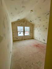 Bedroom 3 on top level with vaulted ceilings Photo taken 1/31/25